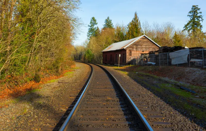 Roadroad train track in historic antique district in Aurora Oregon on a sunny clear blue sky afternoon