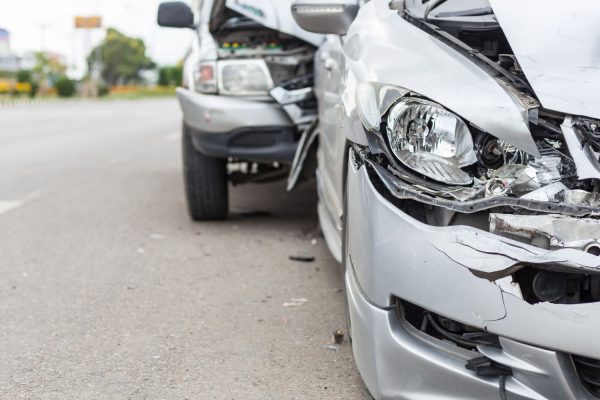 Modern car accident involving two cars on the road in Thailand