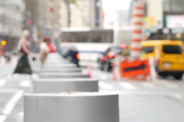 New York City, United States, Manhattan Downtown Church and Fulton street traffic, crossroad intersection crosswalk. Yellow taxi car, smoke stack. People near USA World Trade Center Oculus. Defocused