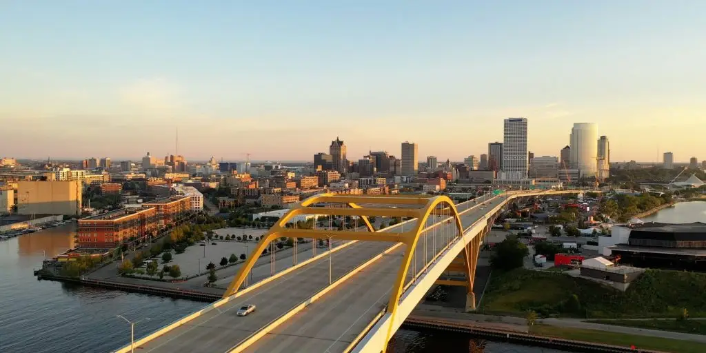 Aerial view of Hoan Memorial Bridge, highway in Milwaukee, Wisconsin, USA. Highway, traffic in morning at sunrise, Downtown in the background.