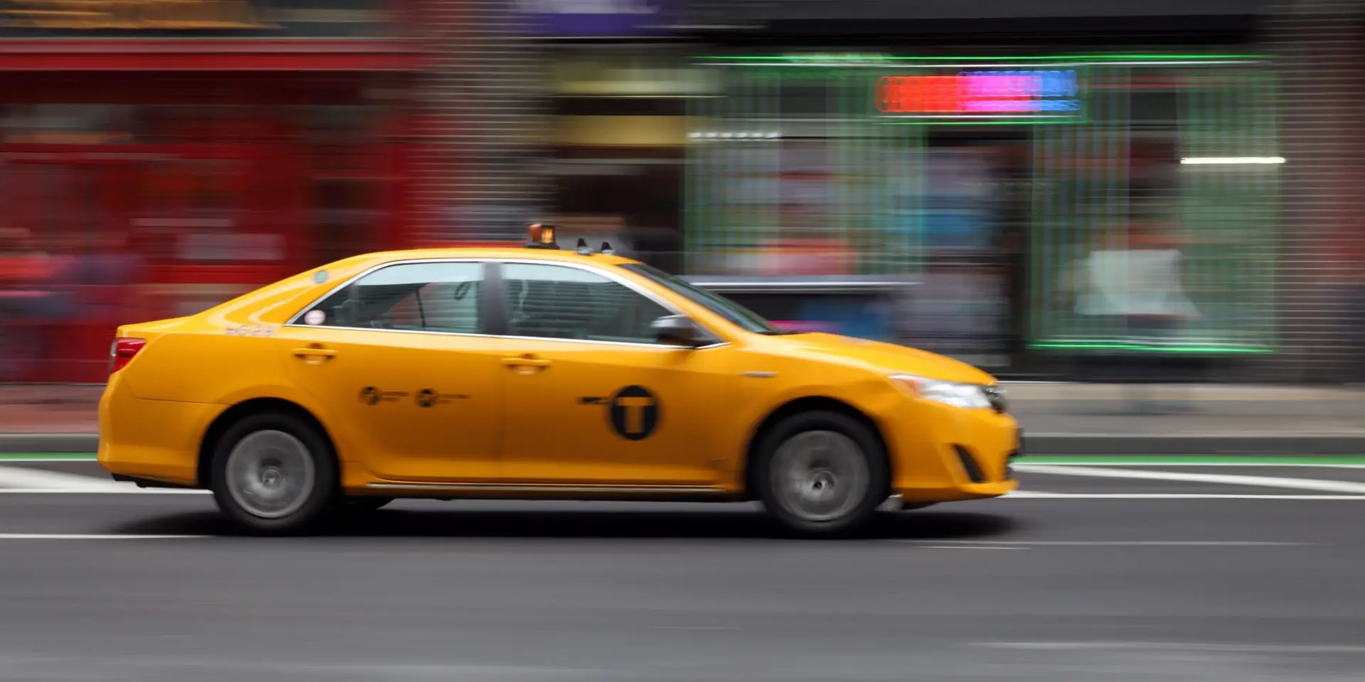 Yellow Cabs (blurred) in Manhattan, New York City, New York, USA